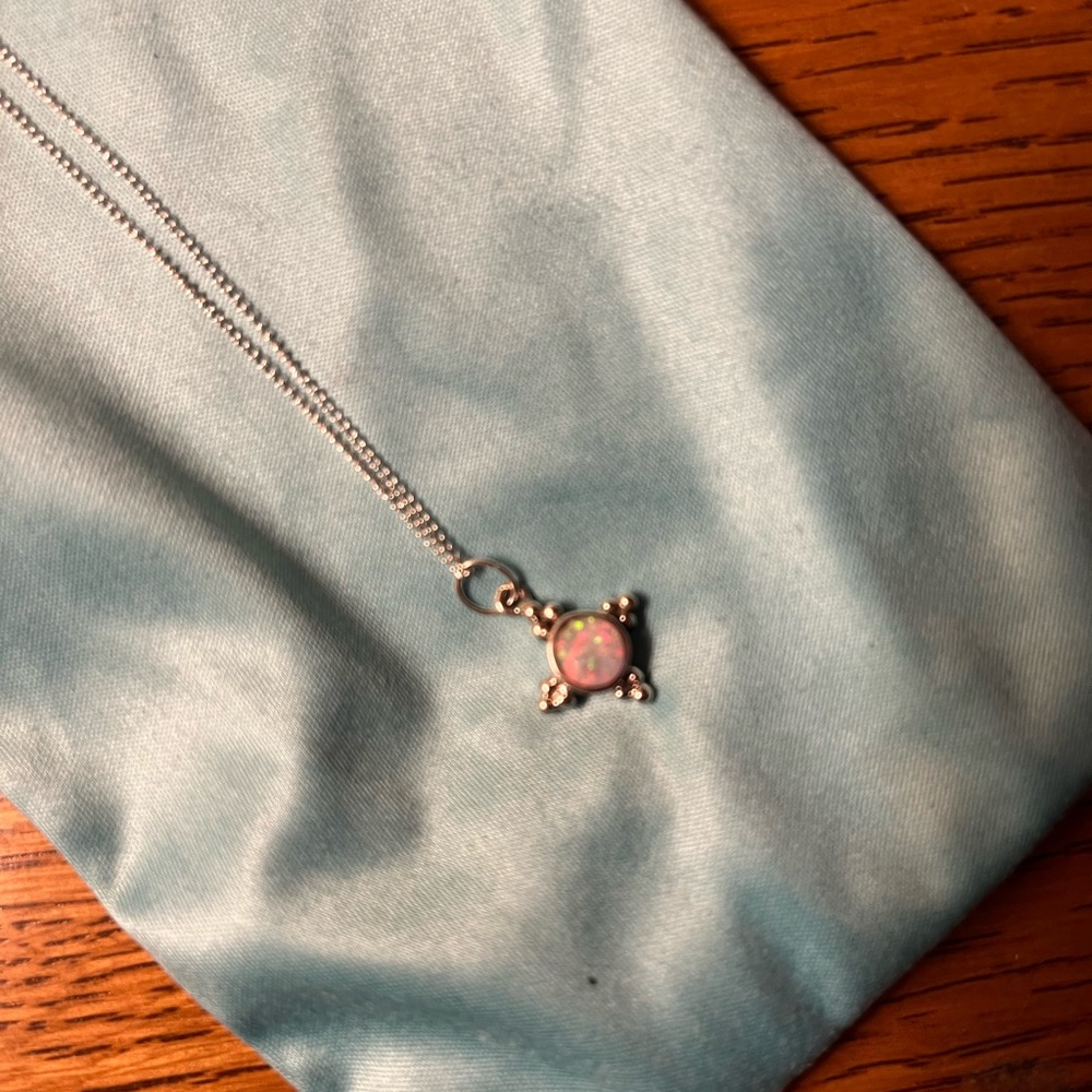 Silver boutique necklace with stone.